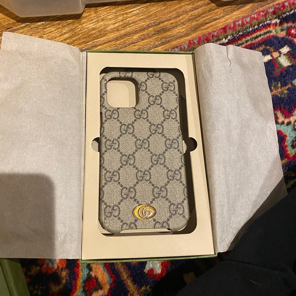 Gucci phone case 13 pro max barley used
